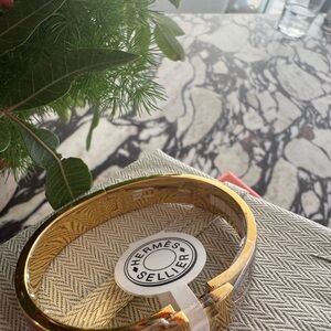 Hermès Gold and Clear Bangle